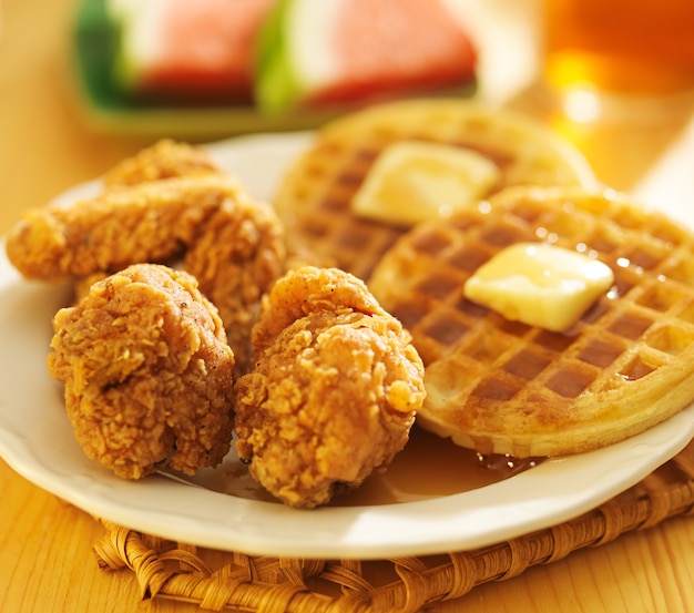 Fried chicken and waffles on a plate