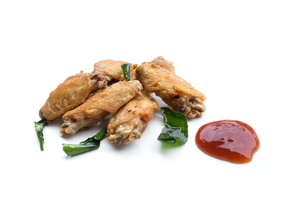 Fried chicken wings and ketchup isolated