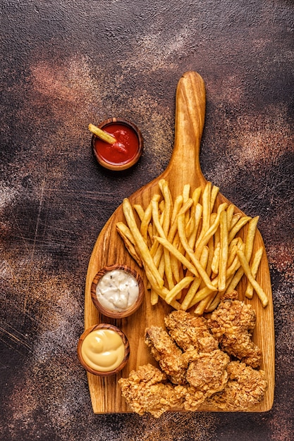 Fried chicken wings with french fries