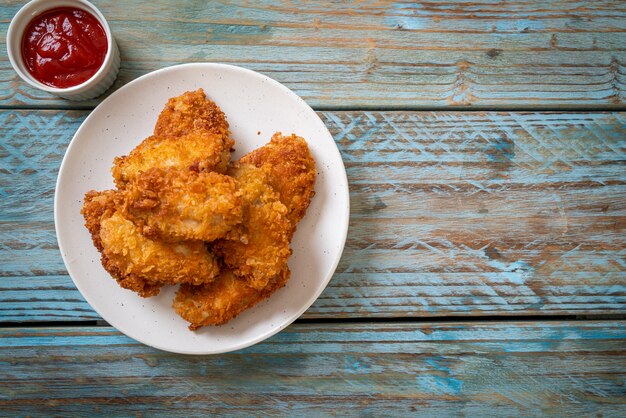 fried chicken wings with ketchup