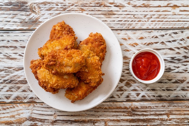 fried chicken wings with ketchup