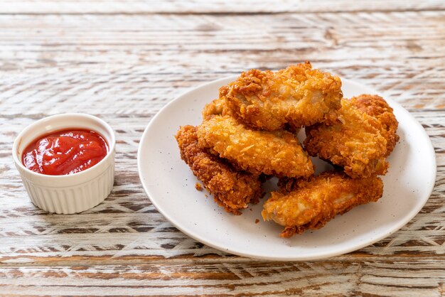 fried chicken wings with ketchup