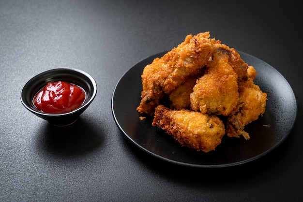 fried chicken wings with ketchup