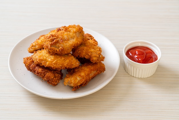 fried chicken wings with ketchup