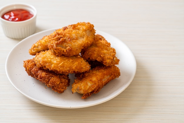 fried chicken wings with ketchup