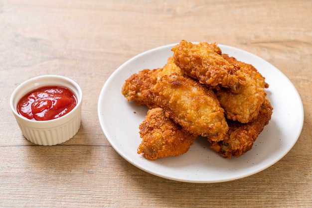 fried chicken wings with ketchup