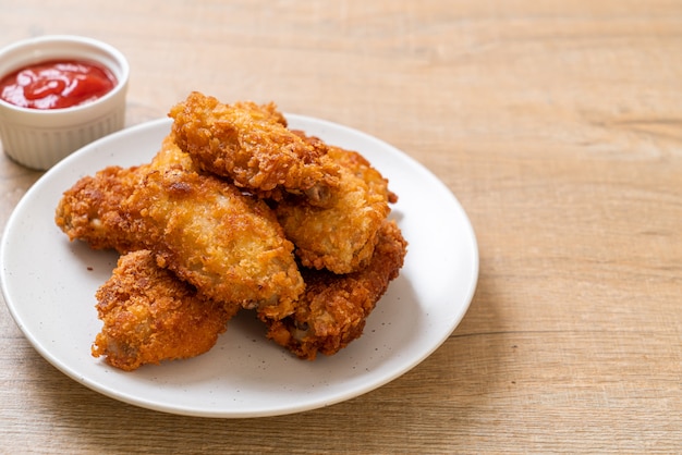 fried chicken wings with ketchup