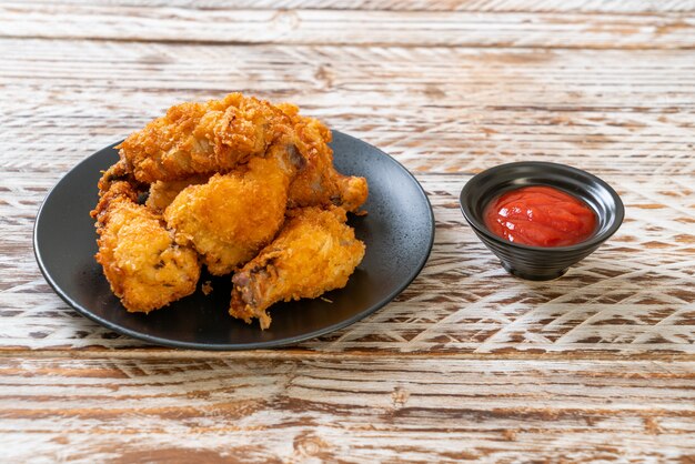 fried chicken wings with ketchup