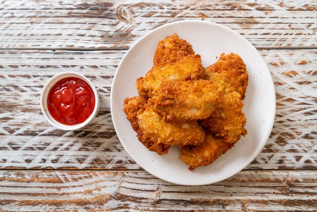 fried chicken wings with ketchup