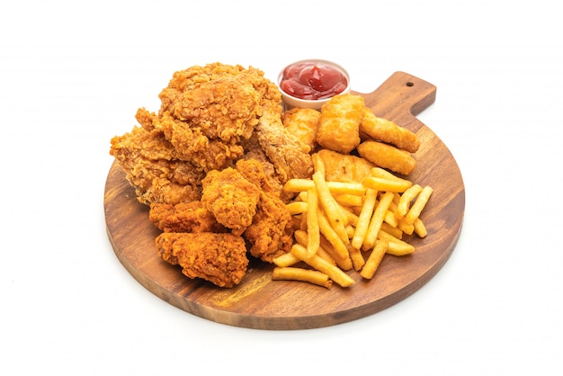 fried chicken with french fries and nuggets meal (junk food and unhealthy food)