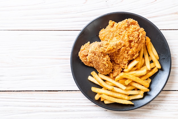 fried chicken with french fries and nuggets meal