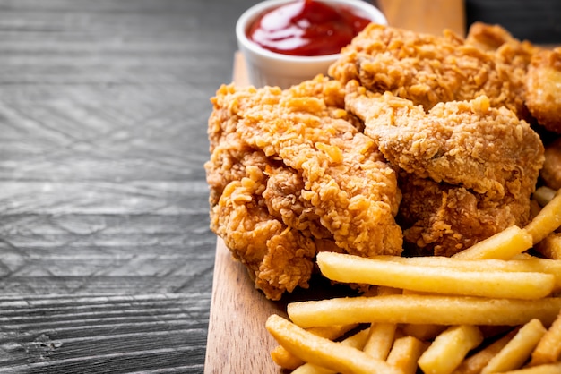 fried chicken with french fries and nuggets meal