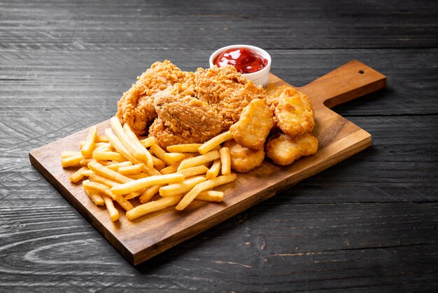 fried chicken with french fries and nuggets meal