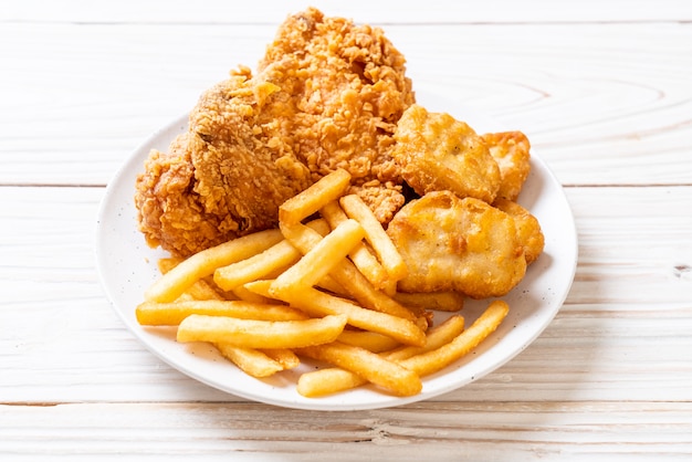 fried chicken with french fries and nuggets meal