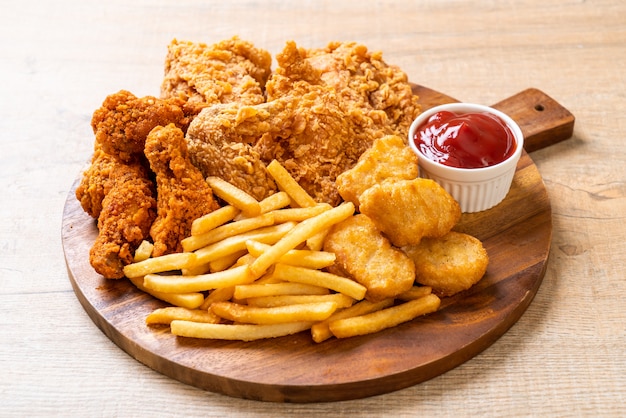 fried chicken with french fries and nuggets meal