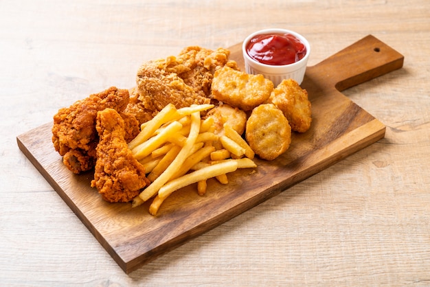 fried chicken with french fries and nuggets meal