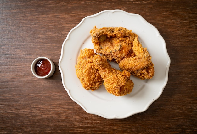 fried chicken with ketchup on plate - unhealthy food