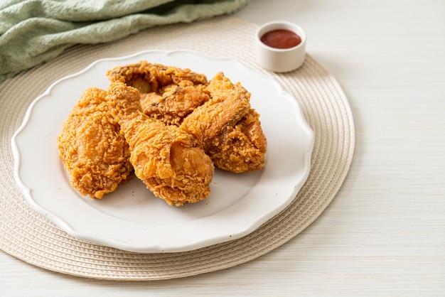 fried chicken with ketchup on plate - unhealthy food