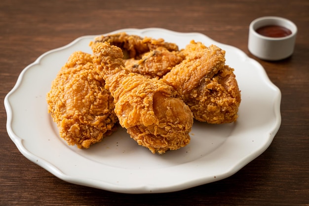 Fried chicken with ketchup on plate unhealthy food