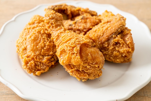 Fried chicken with ketchup on plate