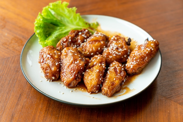 fried chicken with Korean spicy sauce and white sesame