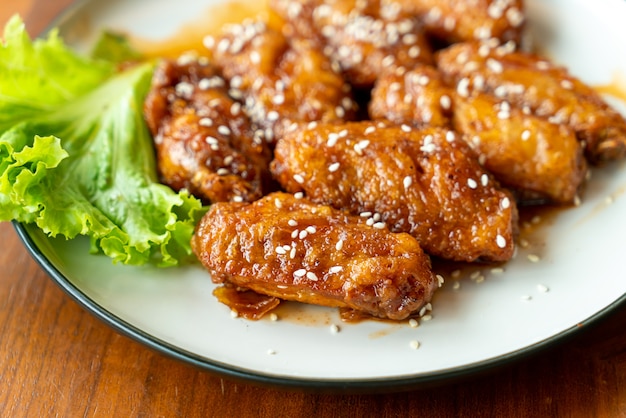 fried chicken with Korean spicy sauce and white sesame
