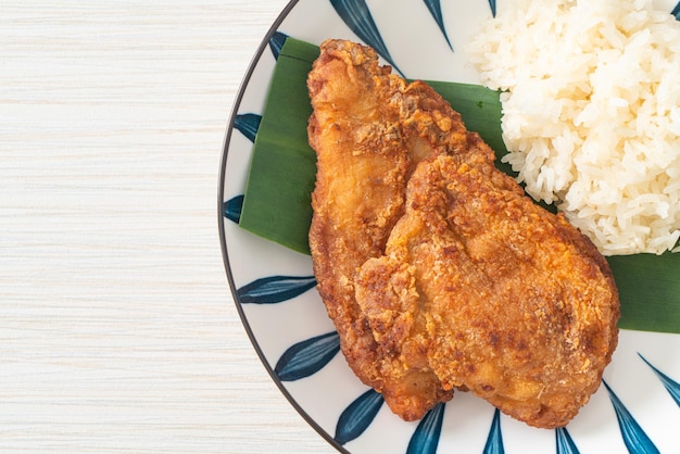 fried chicken with sticky rice and spicy sweet sauce