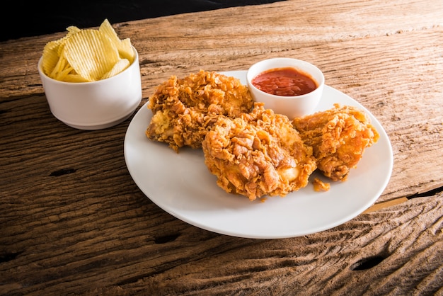 fried chicken on the wooden table