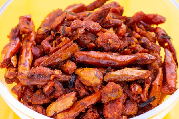 Fried chili spicy snack on white background