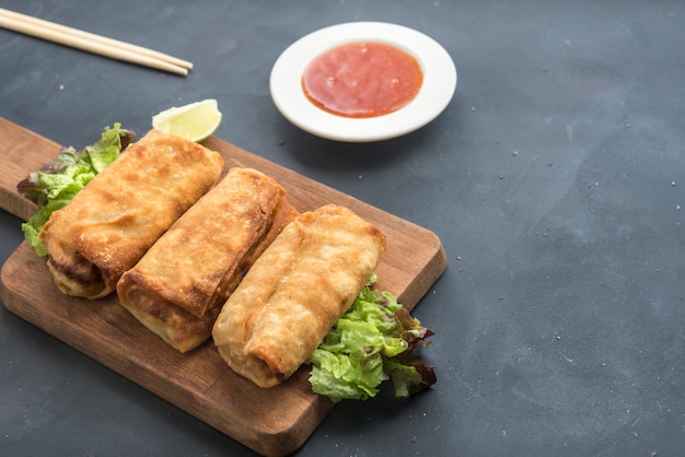 Fried chinese spring rolls with sweet chili sauce