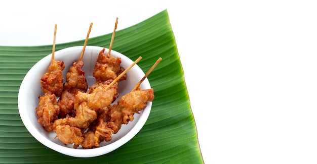 Fried crispy chicken skewers, Thai style street food