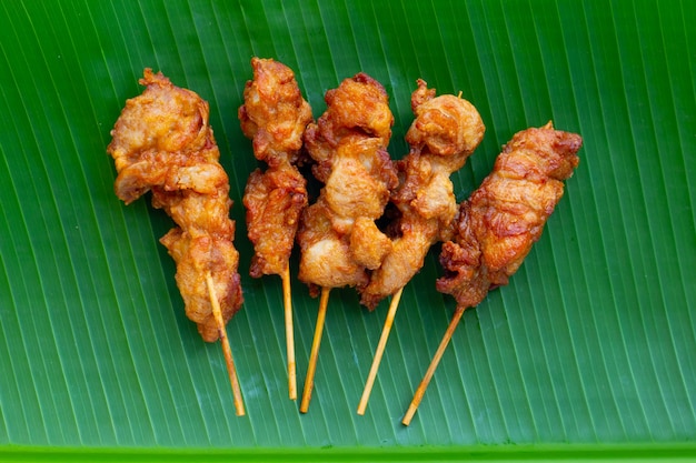 Fried crispy chicken skewers, Thai style street food