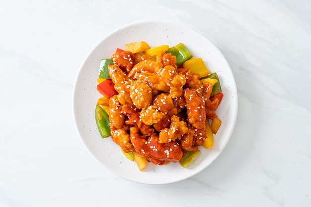 fried crispy chicken with sweet and sour sauce in Korean style