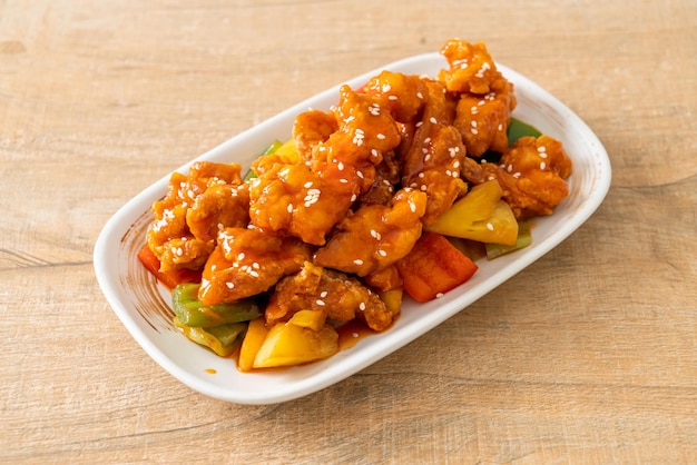 fried crispy chicken with sweet and sour sauce in Korean style