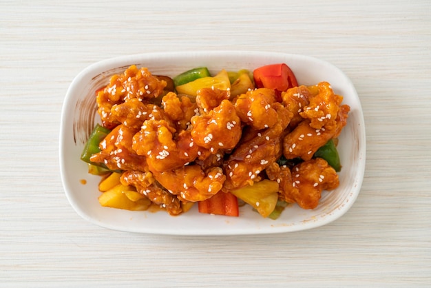 fried crispy chicken with sweet and sour sauce in Korean style