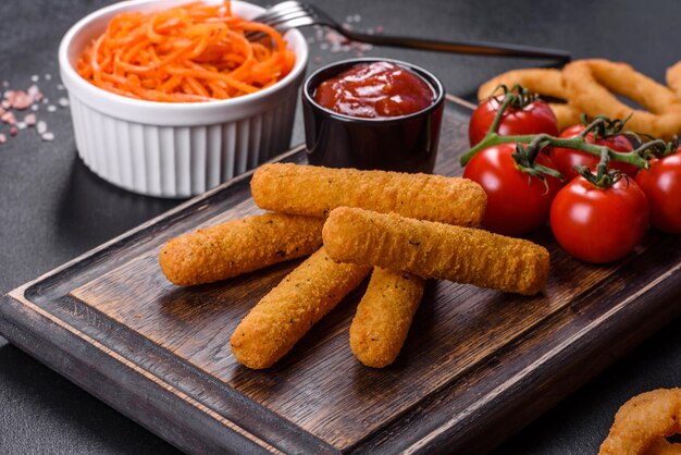 Fried crispy nutritious cheese or potato sticks Snacks for beer