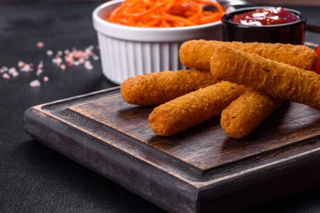 Fried crispy nutritious cheese or potato sticks Snacks for beer