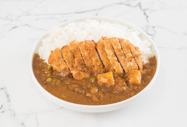 Photo fried cutlet pork with curry on rice