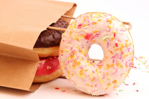 Fried donuts in a paper shopping bags