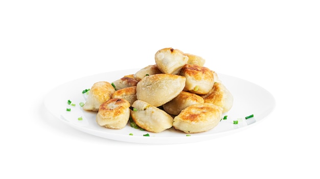 Fried dumplings with potatoes and green onion isolated.