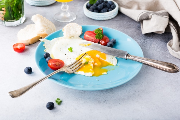 Fried egg and orange juice