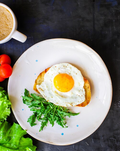 fried egg and toast bread salad delicious breakfast snack yolk and protein portion serving food