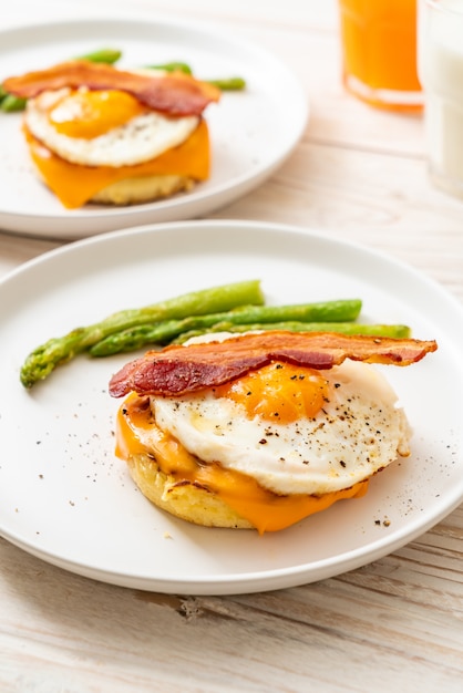 fried egg with bacon and cheese on pancake