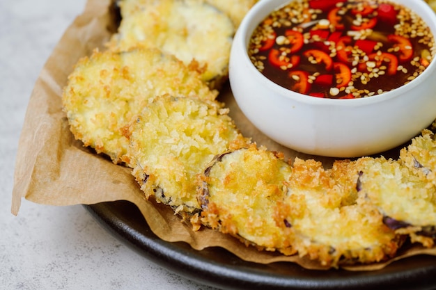 Fried eggplant serve with soy sauce