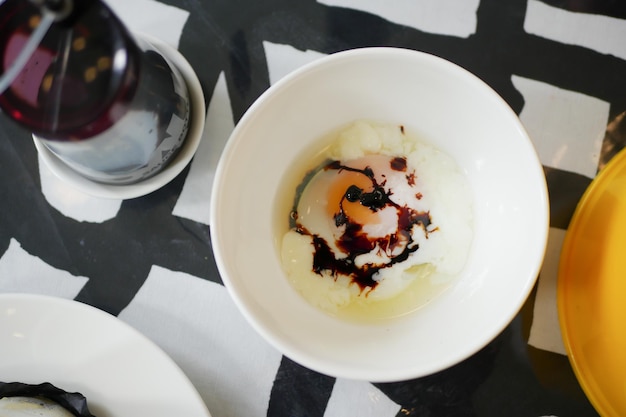 Fried eggs in the plate close up