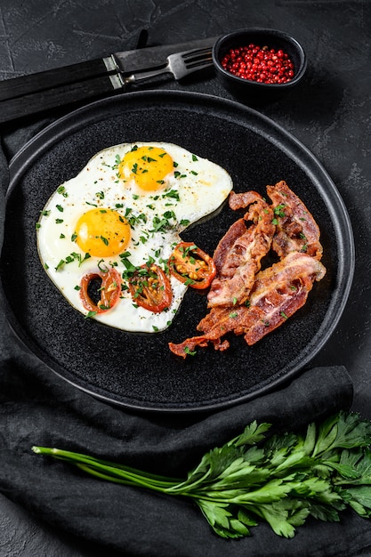 Fried eggs with bacon. 