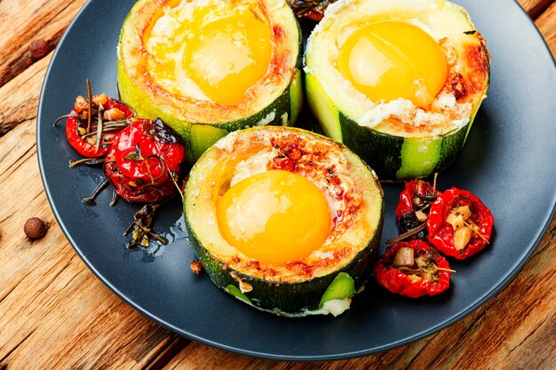 Fried eggs with cherry tomatoes in plate.Fried eggs for healthy breakfast