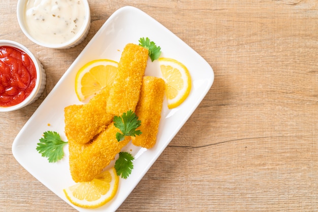Photo fried fish finger stick or french fries fish with sauce