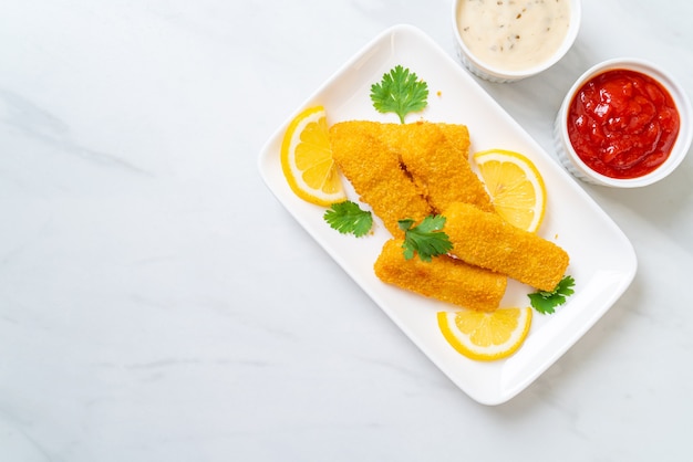 Fried fish finger stick or french fries fish with sauce