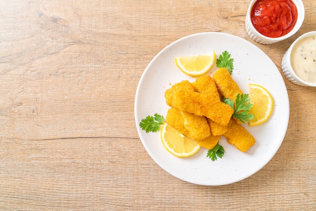 Photo fried fish finger stick